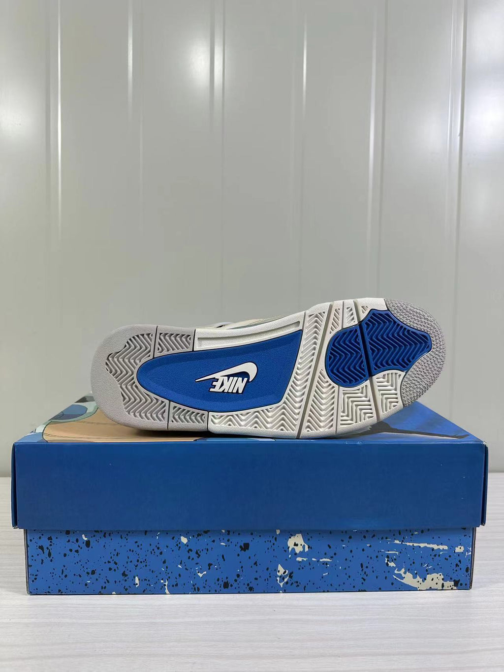 Air Jordan 4 Retro White Blue 308497-105 - product image from the listing.