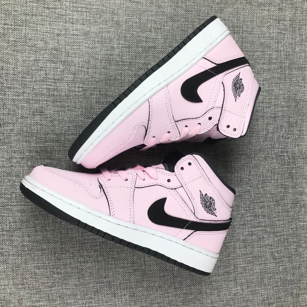 Air Jordan 1 Mid High-Top Sneakers in Pink and Black - product image from the listing.