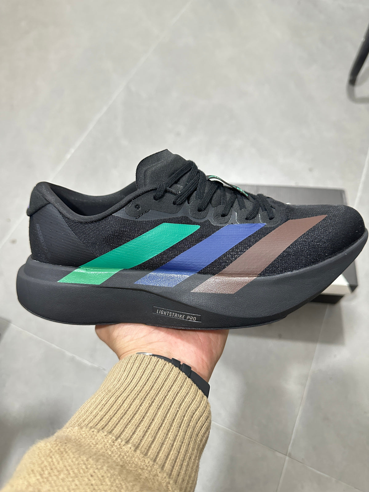 adidas Lightstrike Pro Running Shoes in Black Multicolor - product image from the listing.