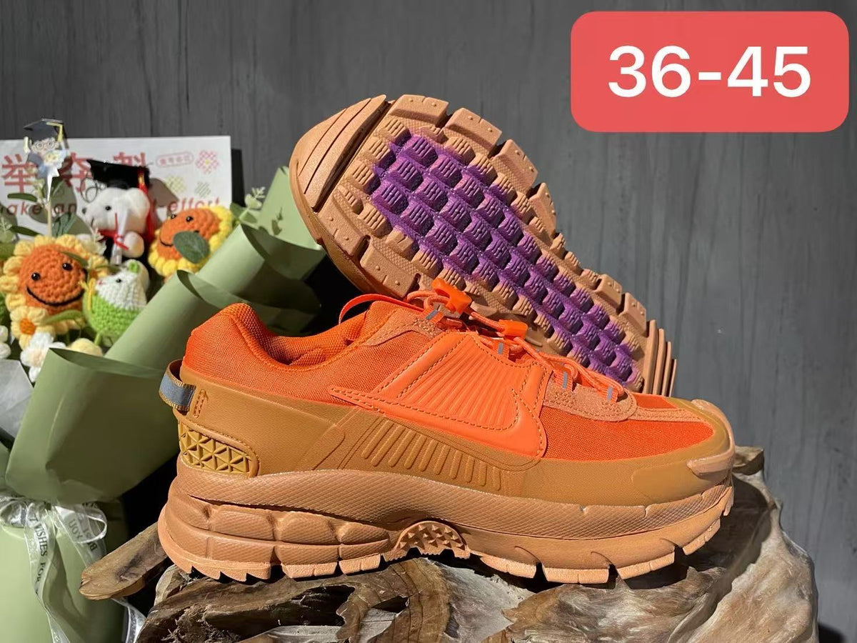 Orange Nike F7 Gen 2 Trail Sneakers - product image from the listing.