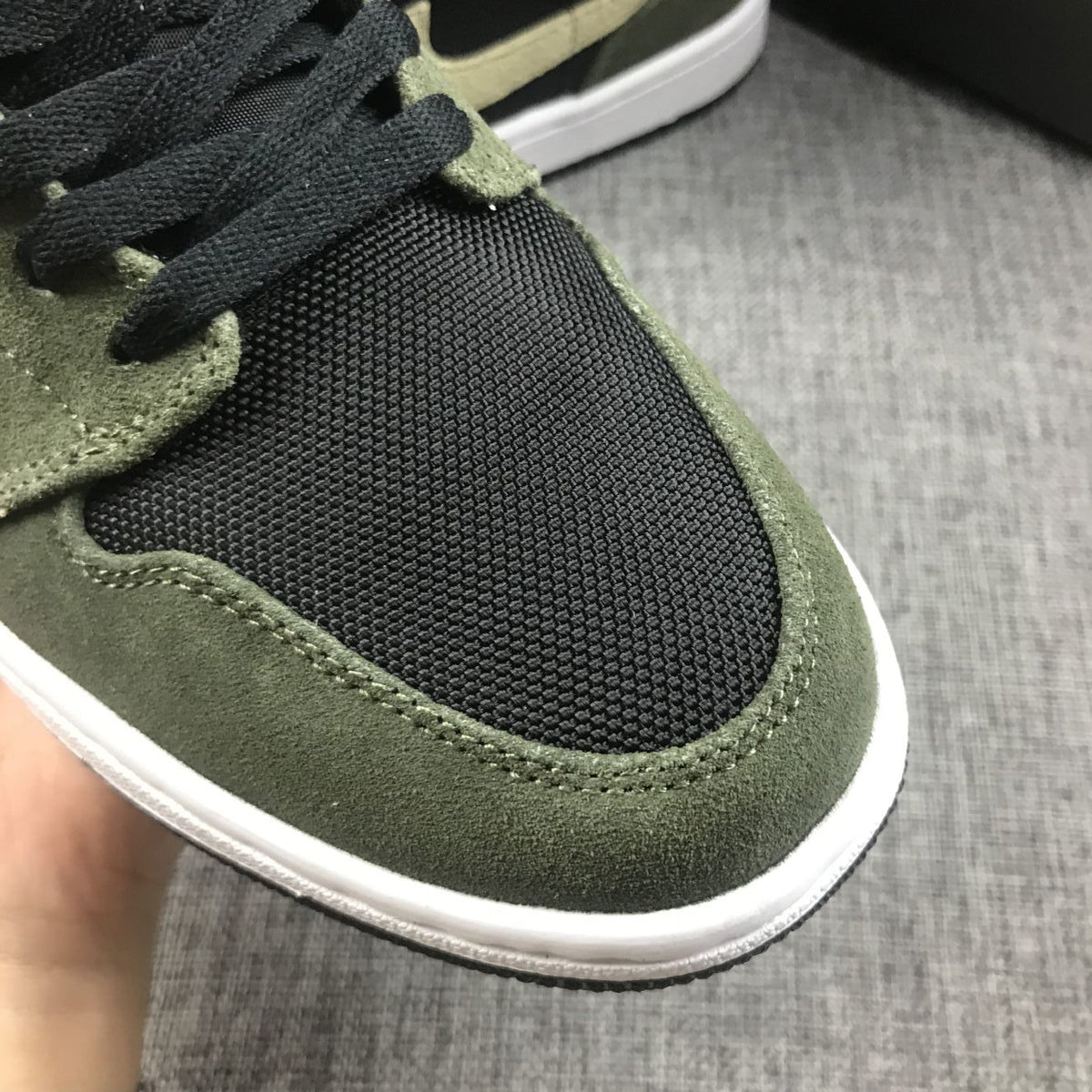 Air Jordan 1 Mid Sneakers in Olive Green BQ6472-030 - product image from the listing.