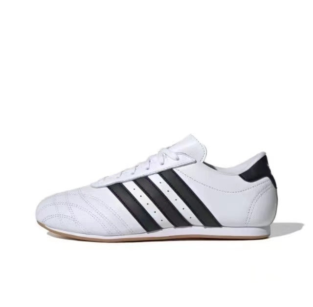 Adidas JS1194 White and Black Low-Profile Trainers - product image from the listing.