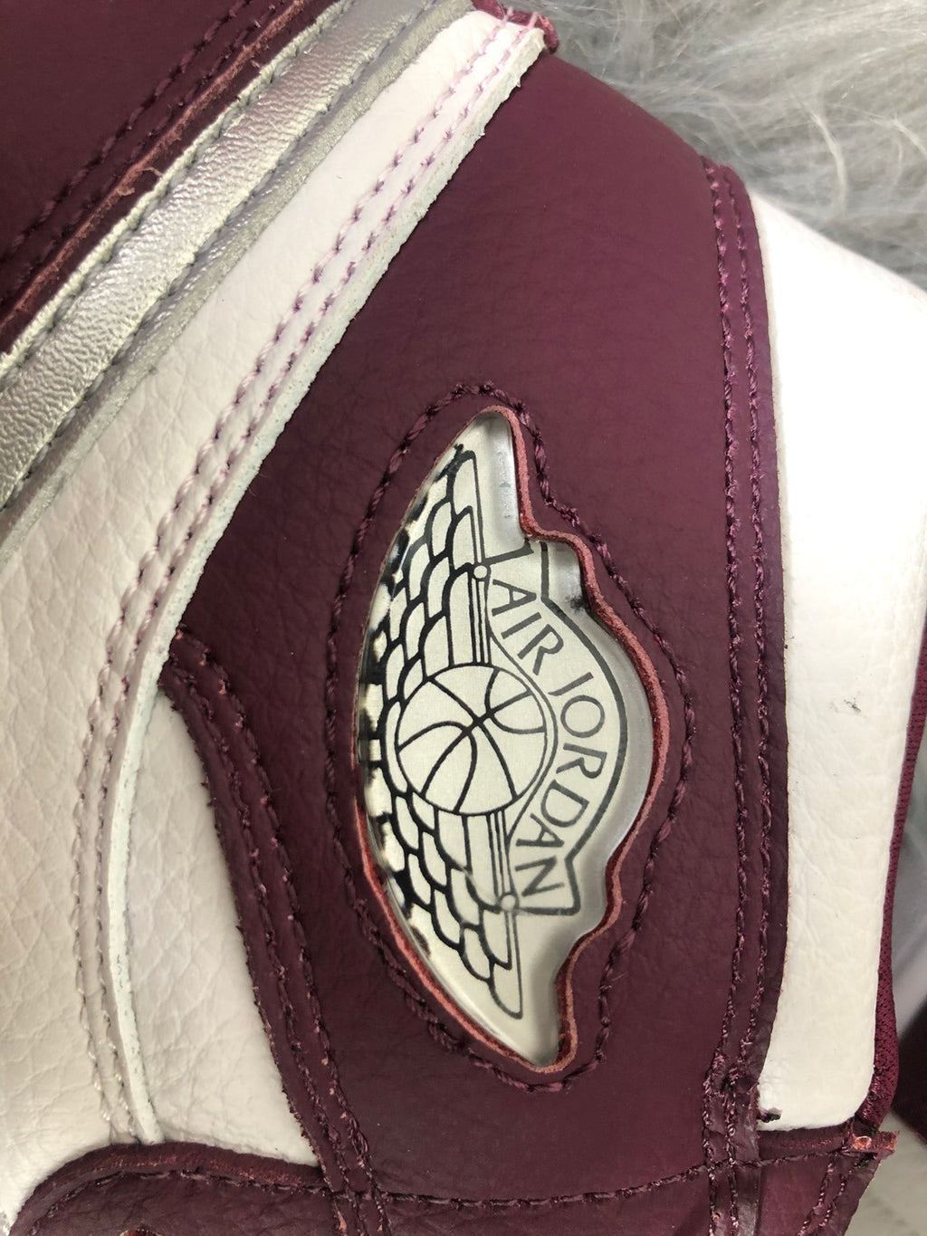 Nike Air Jordan 1 Retro High OG Sneakers in Bordeaux 555088-611 - product image from the listing.