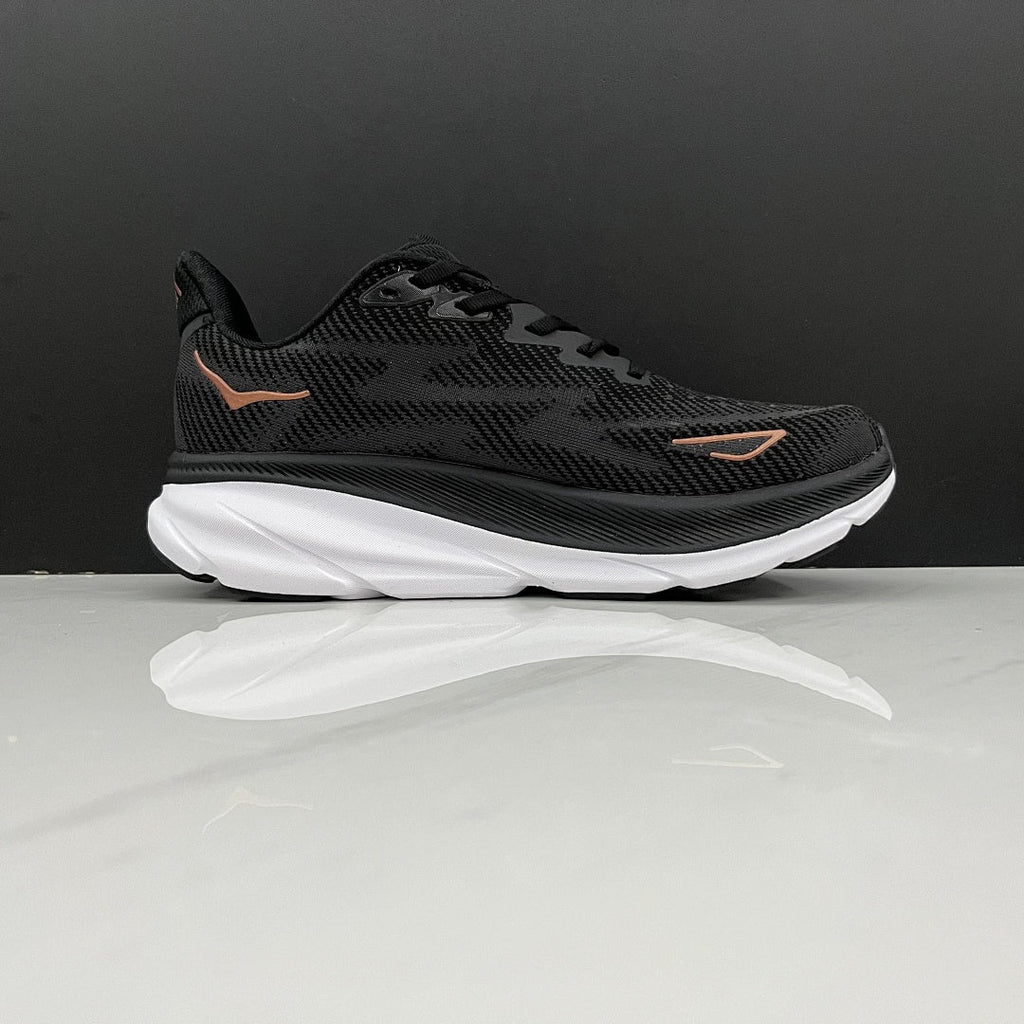 HOKA Clifton 9 Running Shoes in Black and Gold - product image from the listing.