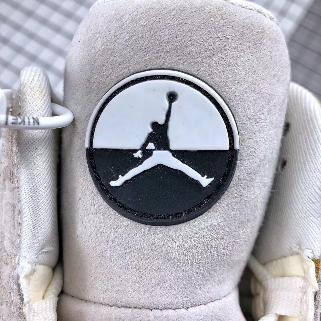 Air Jordan 13 CNY Sneakers in White, in Gold and Pink - product image from the listing.