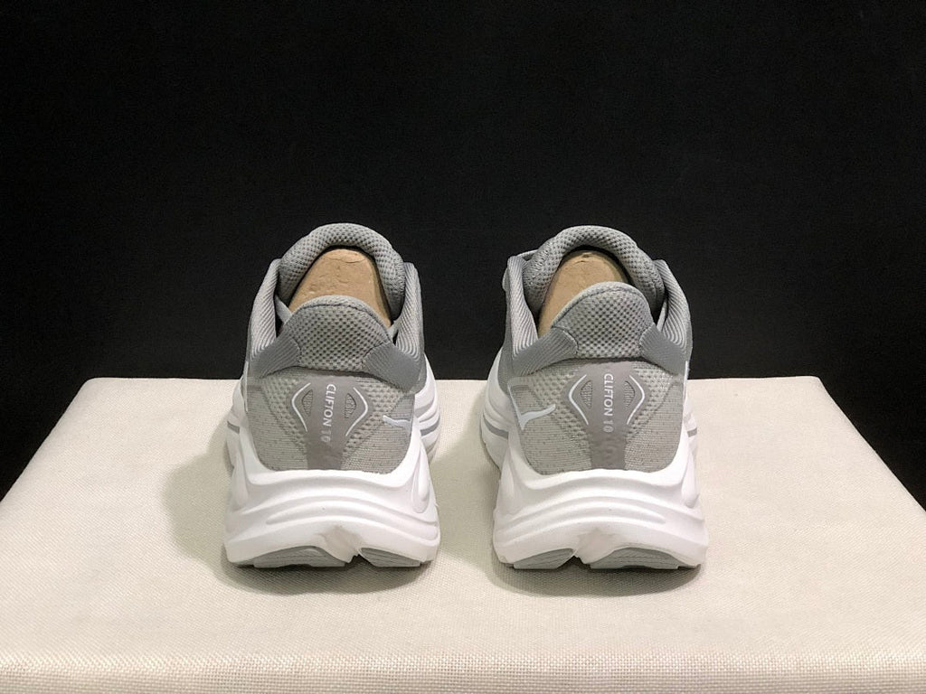 Gray HOKA Clifton 10 Running Shoes - product image from the listing.