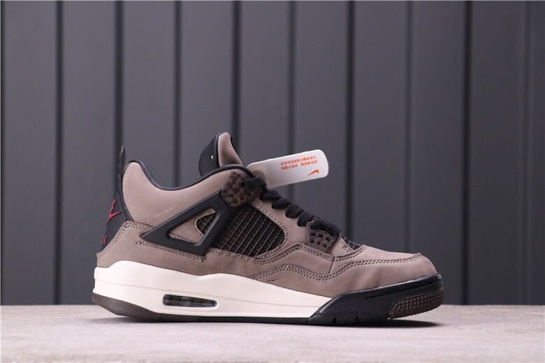 Women's Air Jordan 4 Rasta Sneakers - product image from the listing.