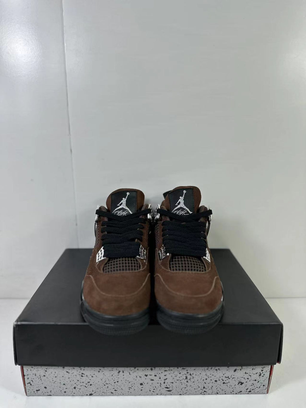 Air Jordan 4 Retro Brown Black AQ9129-002 - product image from the listing.