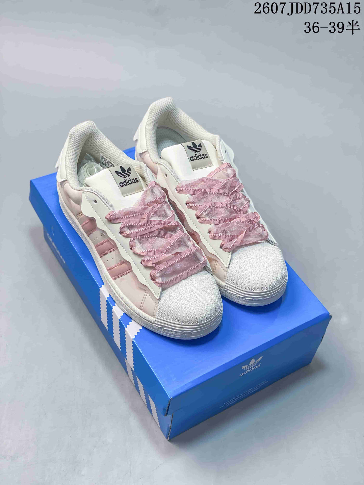 adidas Superstar Sneakers in White and Pink 2607JDD735A15 - product image from the listing.
