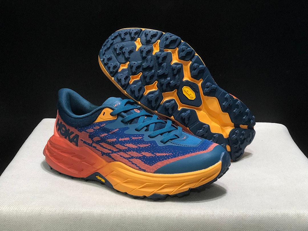 HOKA Speedgoat 5 Trail Running Shoes, in Blue and Orange - product image from the listing.