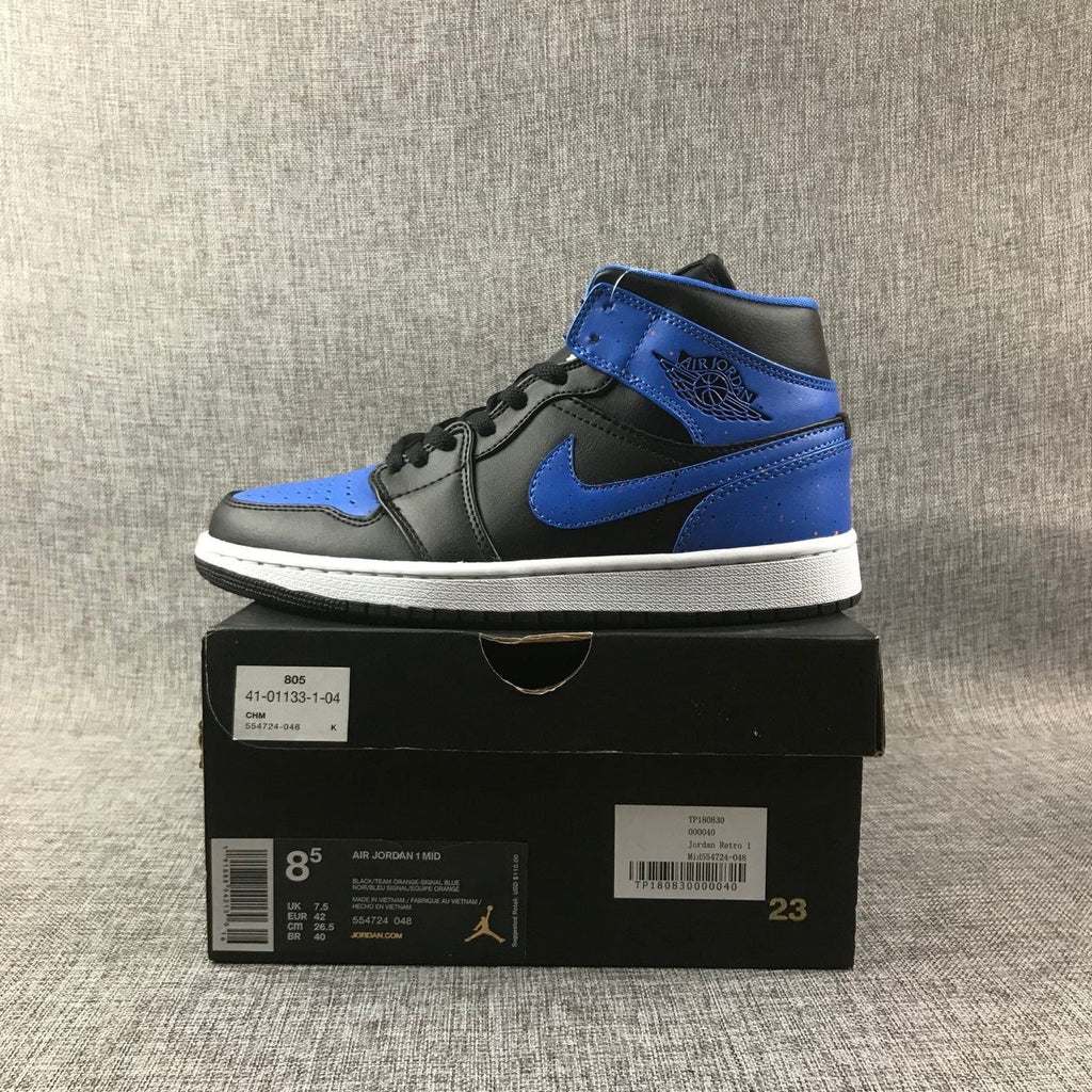 Air Jordan 1 Mid High-Top Sneakers in Black and Blue - product image from the listing.