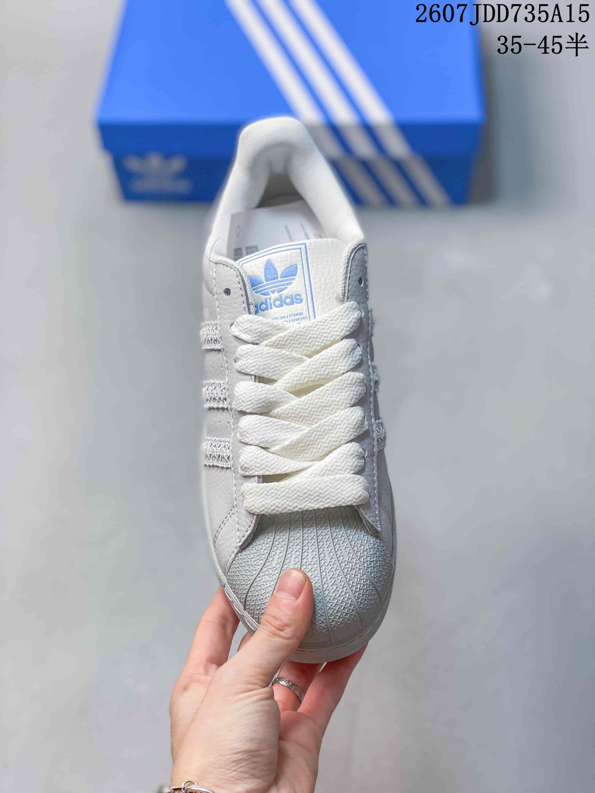 adidas Superstar Sneakers in White Gray Blue 2607JDD735A15 - product image from the listing.