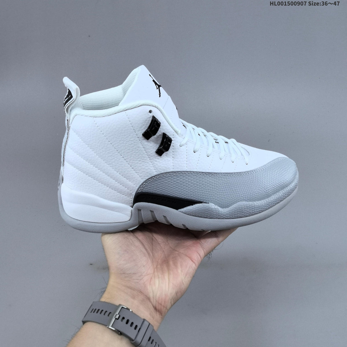 Air Jordan 12 Retro High Barons White Grey Sneakers - product image from the listing.