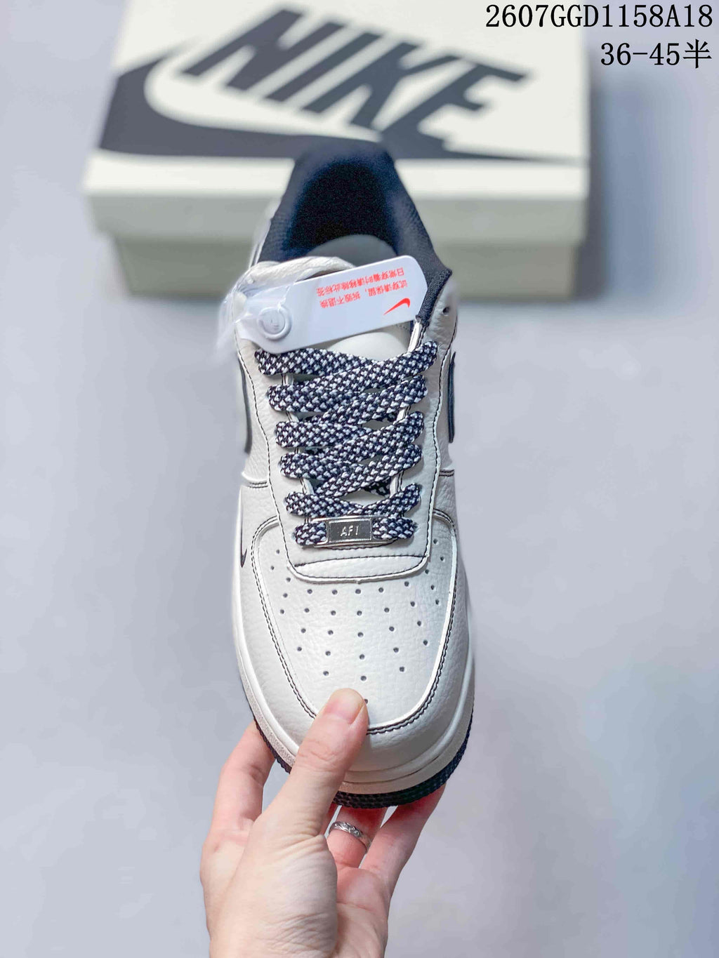 Nike Air Force 1 '07 Low-Top Sneakers in White Navy - product image from the listing.