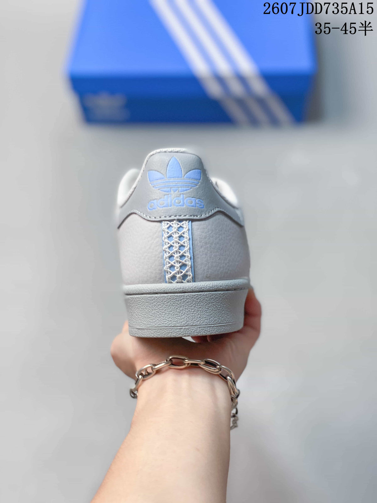 adidas Superstar Sneakers in White Gray Blue 2607JDD735A15 - product image from the listing.