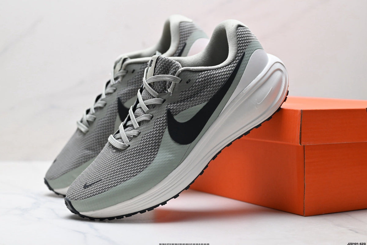 Gray Nike Revolution 8 Running Shoes - product image from the listing.