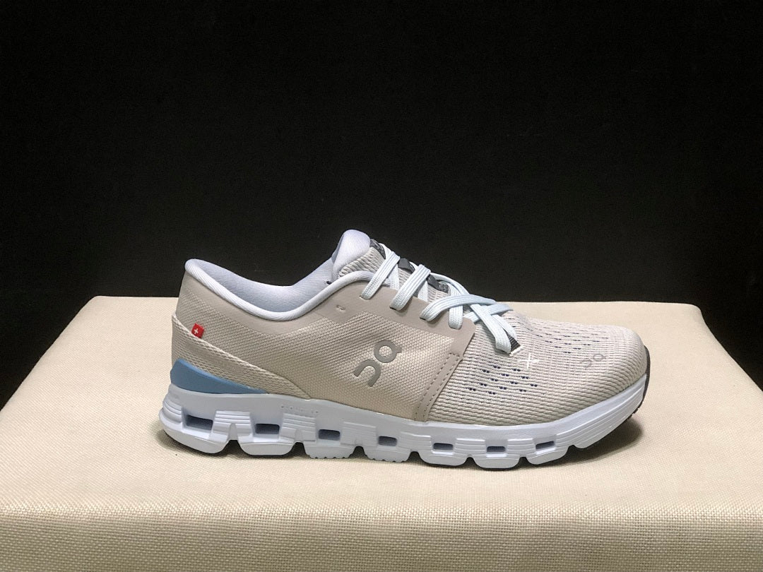 Silver and Blue On Cloud X 4 Sneakers - product image from the listing.