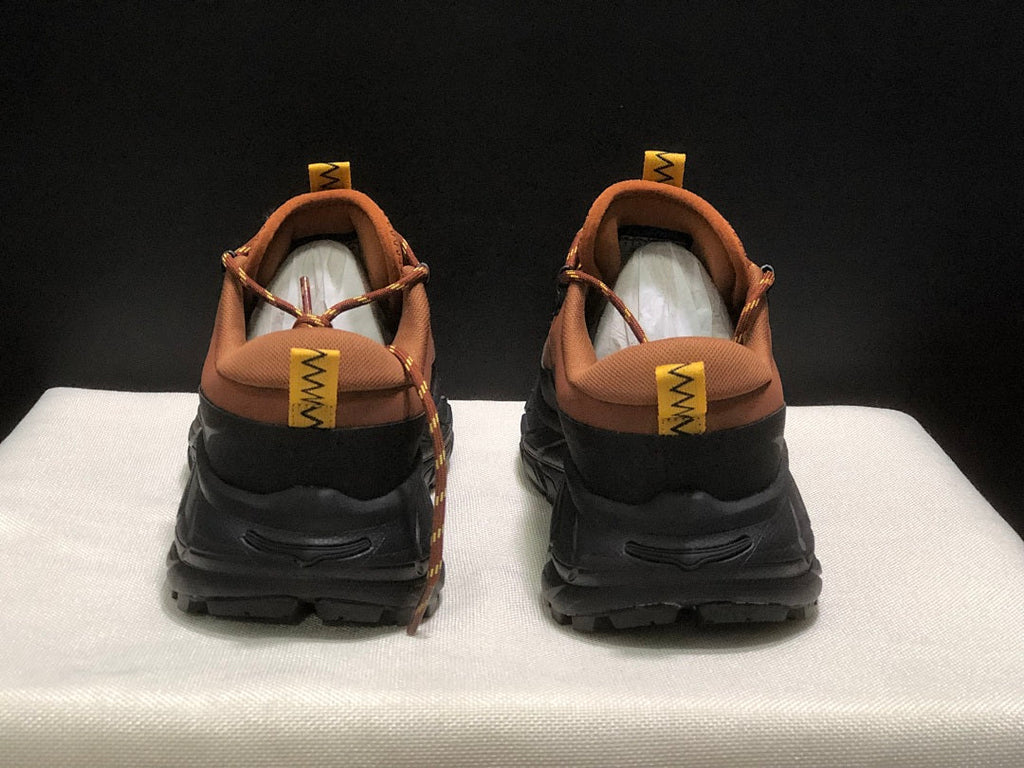 Brown and Black HOKA Tor Summit Hiking Shoes - product image from the listing.
