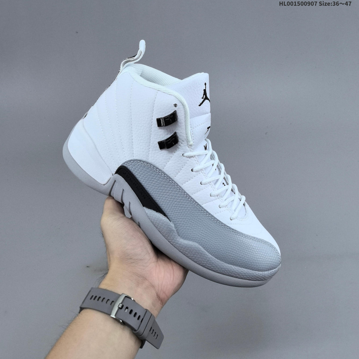 Air Jordan 12 Retro High Barons White Grey Sneakers - product image from the listing.