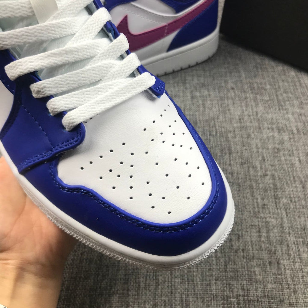 Air Jordan 1 Mid Sneakers in Blue Pink 554724-451 - product image from the listing.