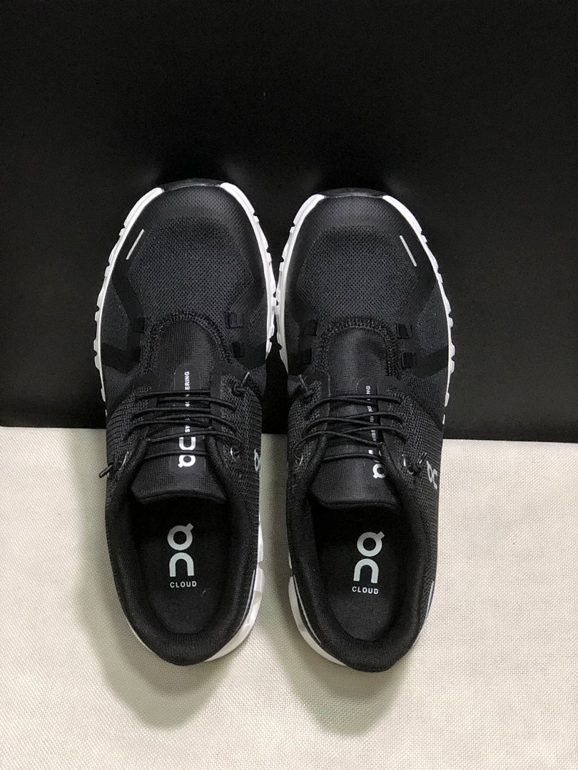 On Cloud 6 Running Sneakers in Black White - product image from the listing.