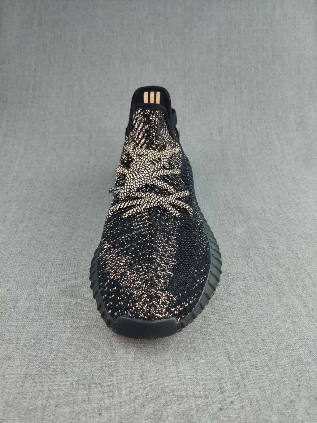 Black and Cream Yeezy 350 V2 Knit Sneakers - product image from the listing.