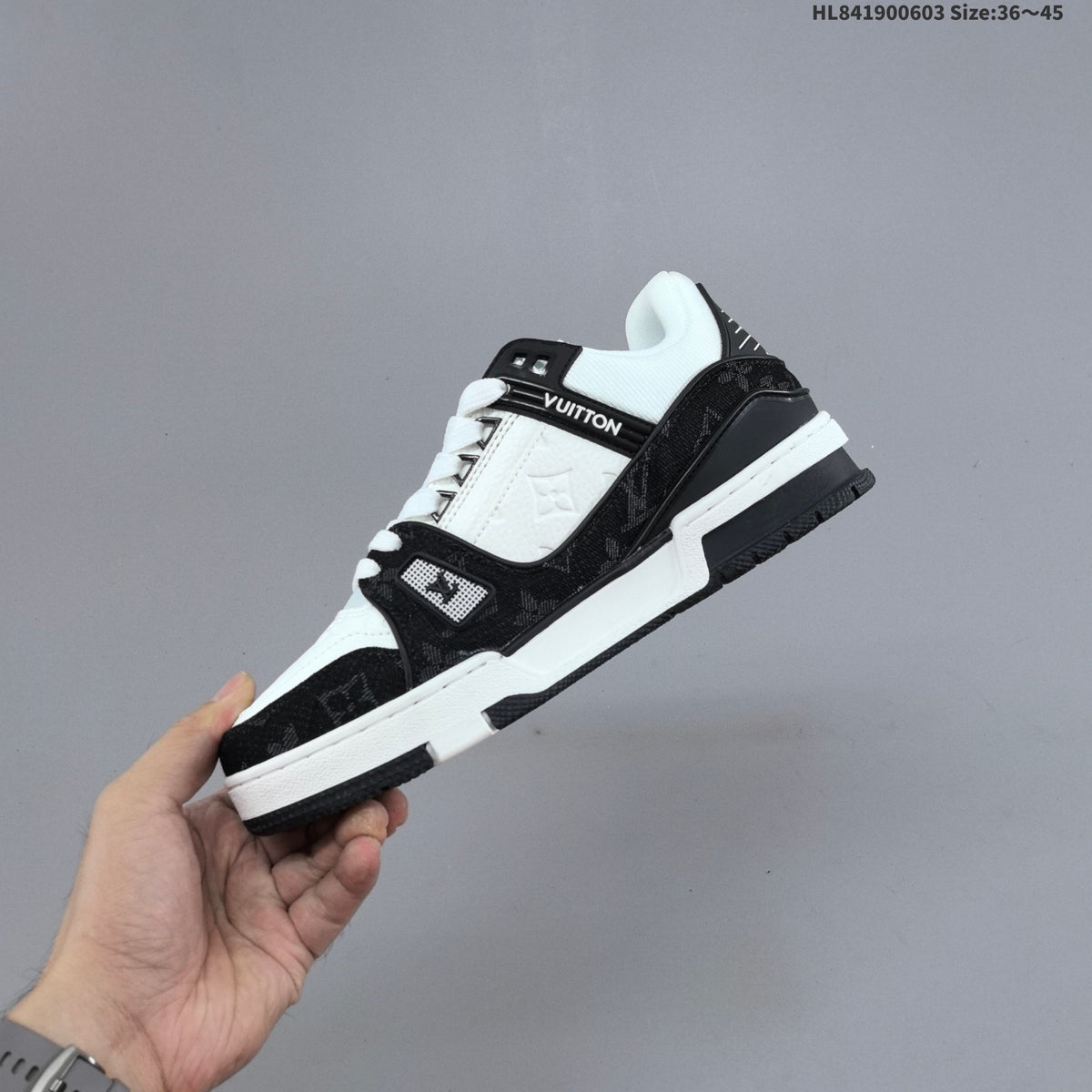 Louis Vuitton Low-Top Sneakers in Black or in Blue and White - product image from the listing.