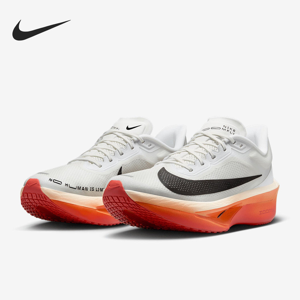 Nike ZoomX Running Shoes in White Black Orange - product image from the listing.